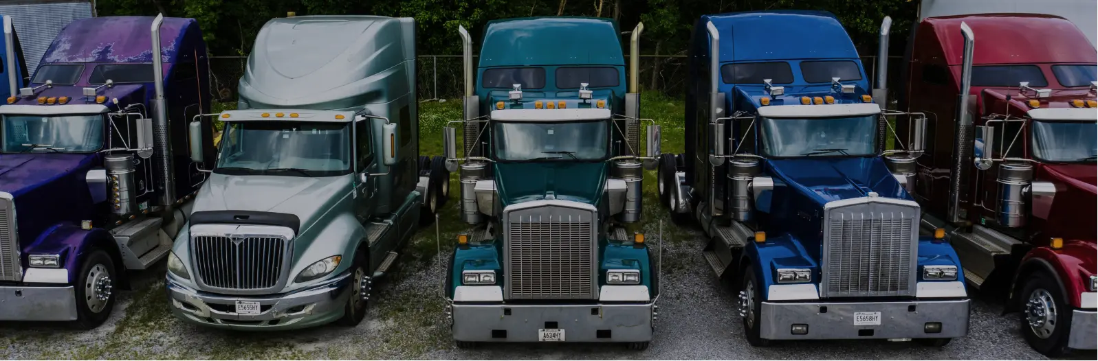 Truck dispatcher reviewing real-time FMCSA compliance alerts
